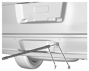 Cadillac Escalade. Dépose du pneu de secours et des outils