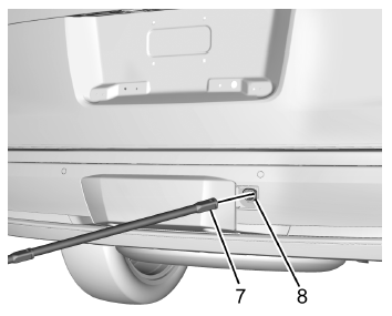 Cadillac Escalade. Entreposage d'un pneu crevé ou d'un pneu de secours et des outils